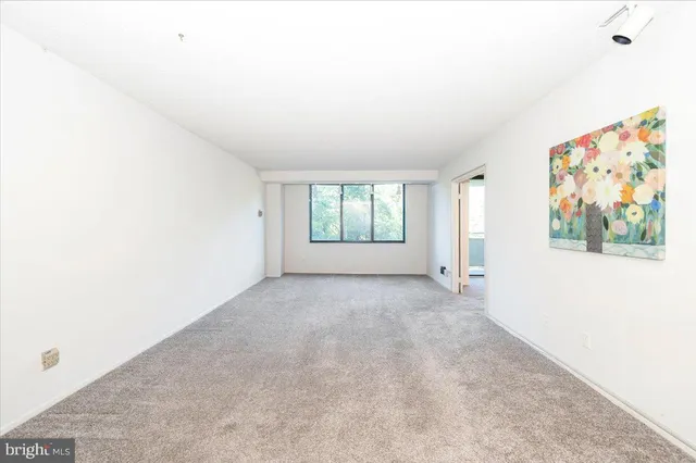 an empty room with white door