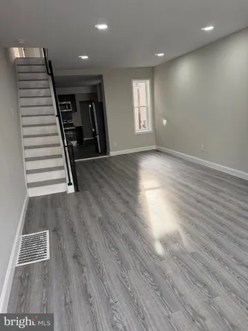 an entryway of a house with stairs