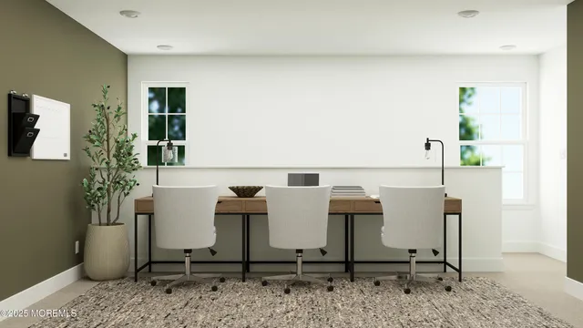 a view of a livingroom with furniture and window