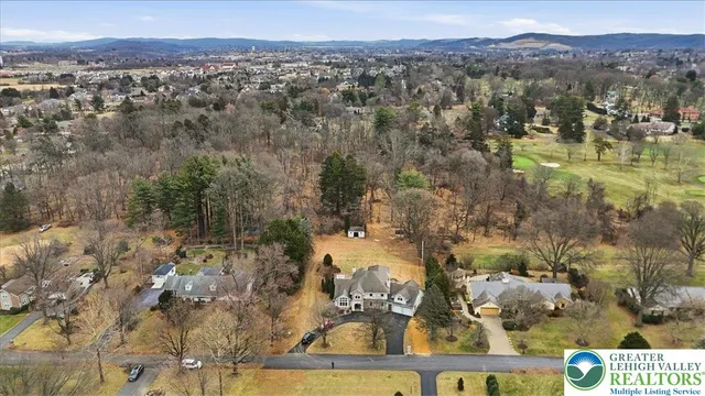 a view of a lake with mountains in the background