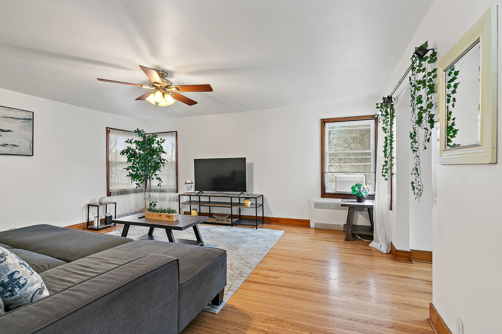 820 Lincoln Highway Rochelle, IL 61068 - Photo 4 of 27 a living room with furniture and a flat screen tv