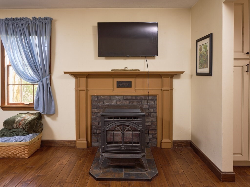 4 Martin Road Brookfield, MA 01506 - Photo 7 of 39 a living room with furniture and a fireplace