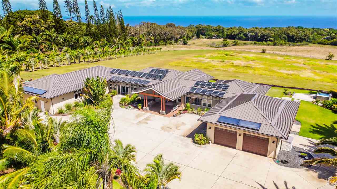 365 East Kuiaha Road, Unit 1 AND SPACIAL 2 Haiku, HI 96708 - Photo 1 of 2 a view of a swimming pool with a patio