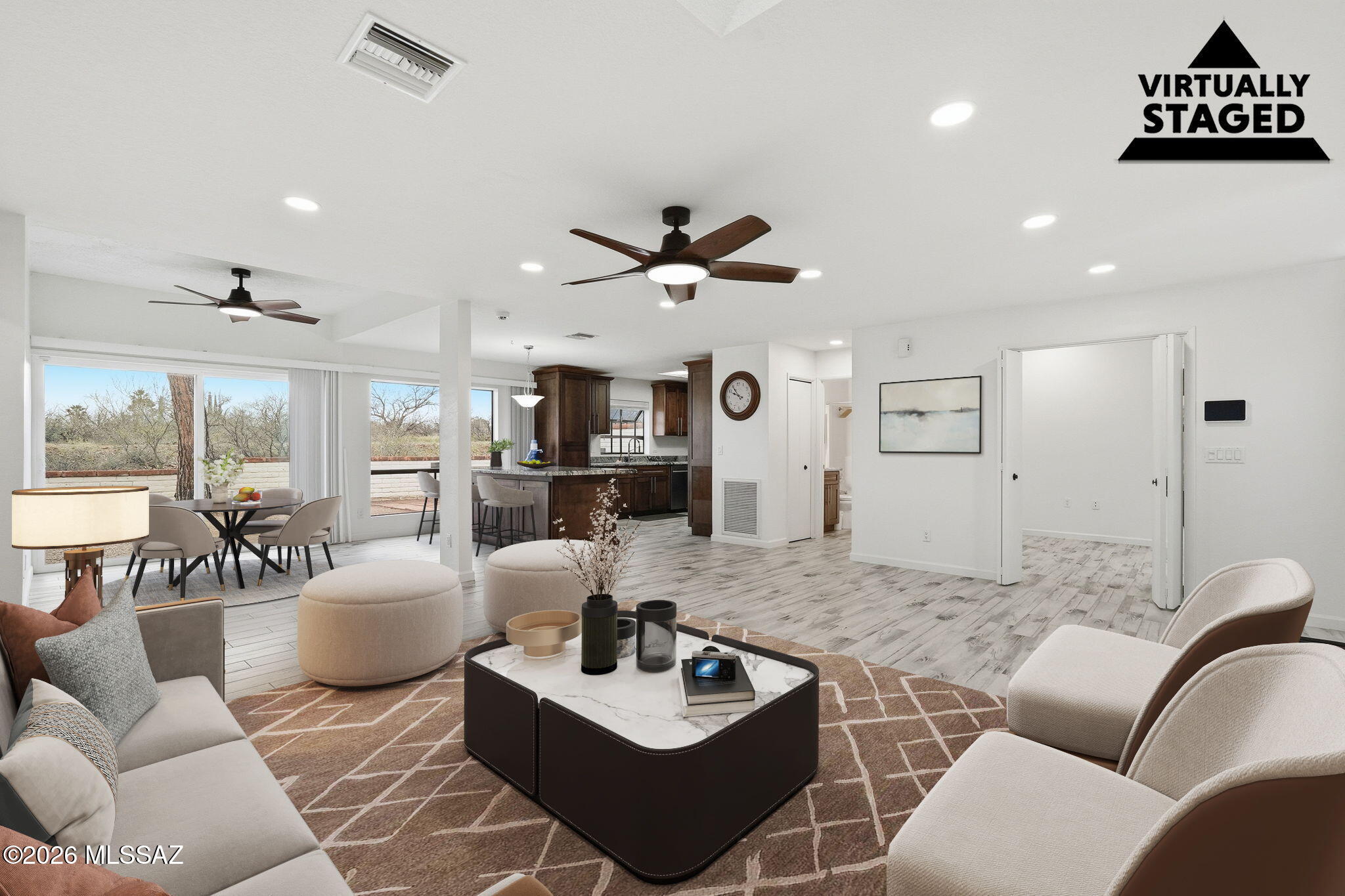 1183 Circulo Canario Rio Rico, AZ 85648 - Photo 2 of 31 a living room with furniture kitchen view and a chandelier