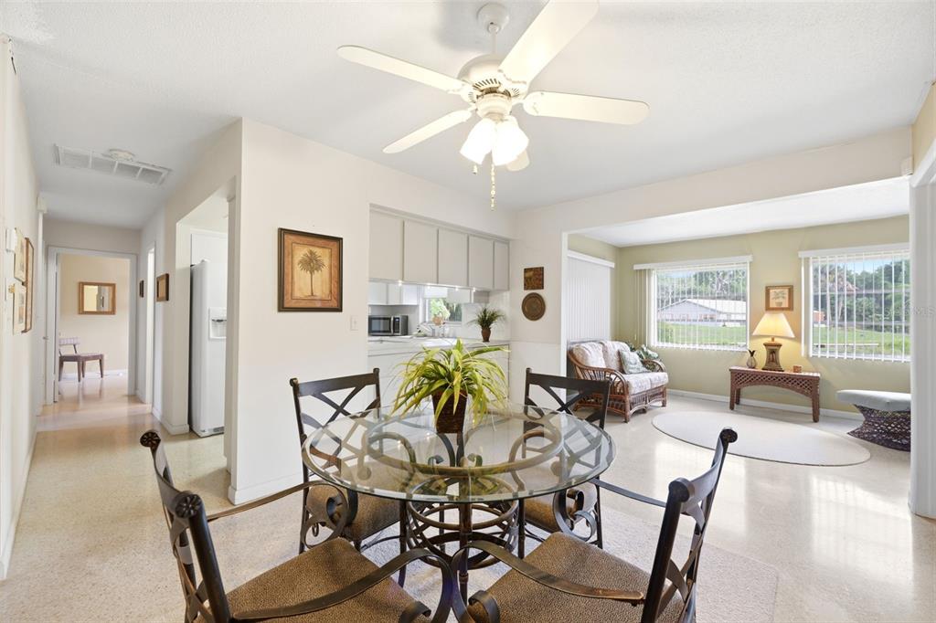 1830 South Mandarin Terrace Inverness, FL 34450 - Photo 42 of 47 a view of a dining room with furniture and wooden floor