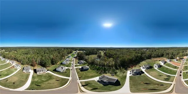 a bathroom with a sink a vanity and a shower