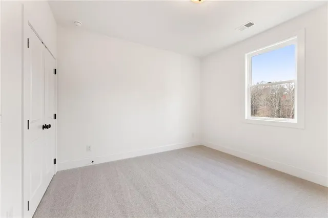 a spacious bathroom with a double vanity sink mirror and double