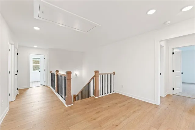 a view of an empty room with a sliding door