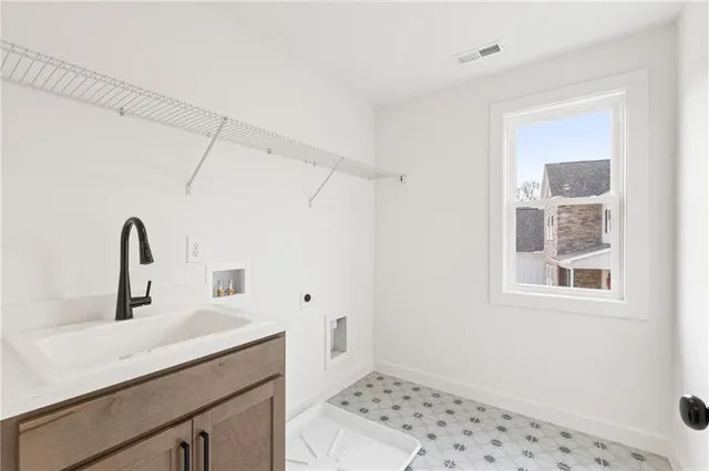 a view of a livingroom with furniture and a couch