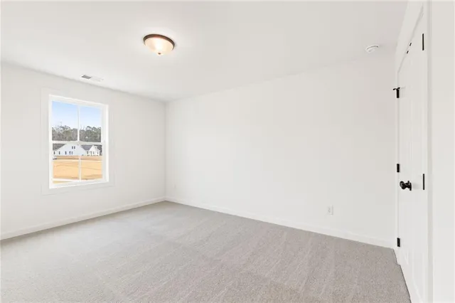 a dining room with furniture window and wooden floor