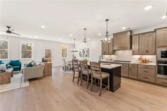 a kitchen with a stove and a microwave