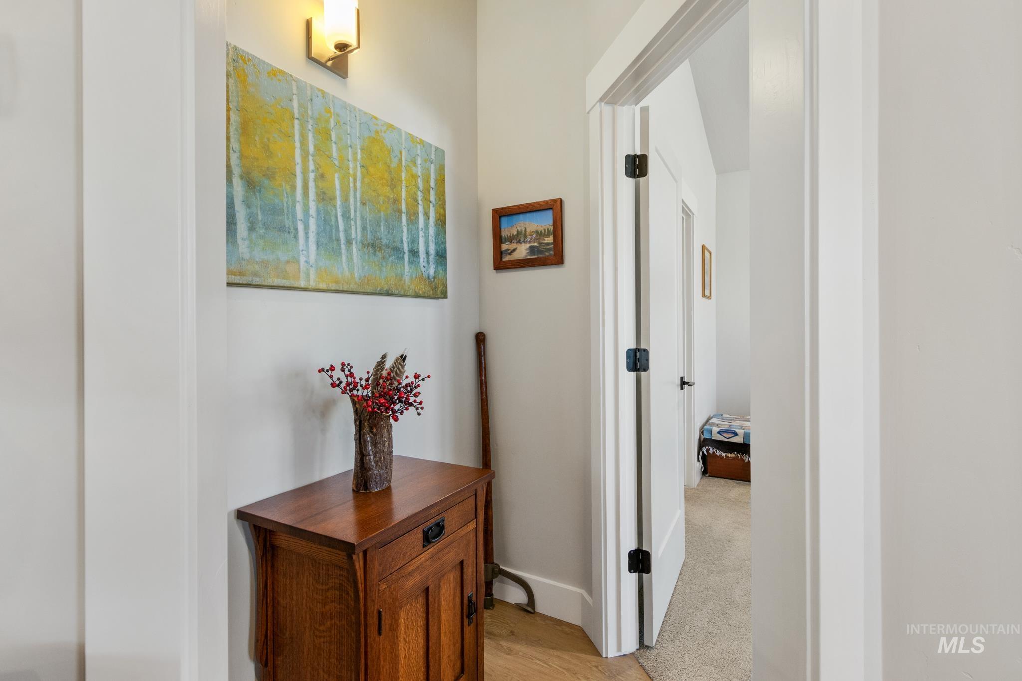 9864 West Aviara Street Star, ID 83669 - Photo 24 of 40 Corridor featuring light wood-style floors