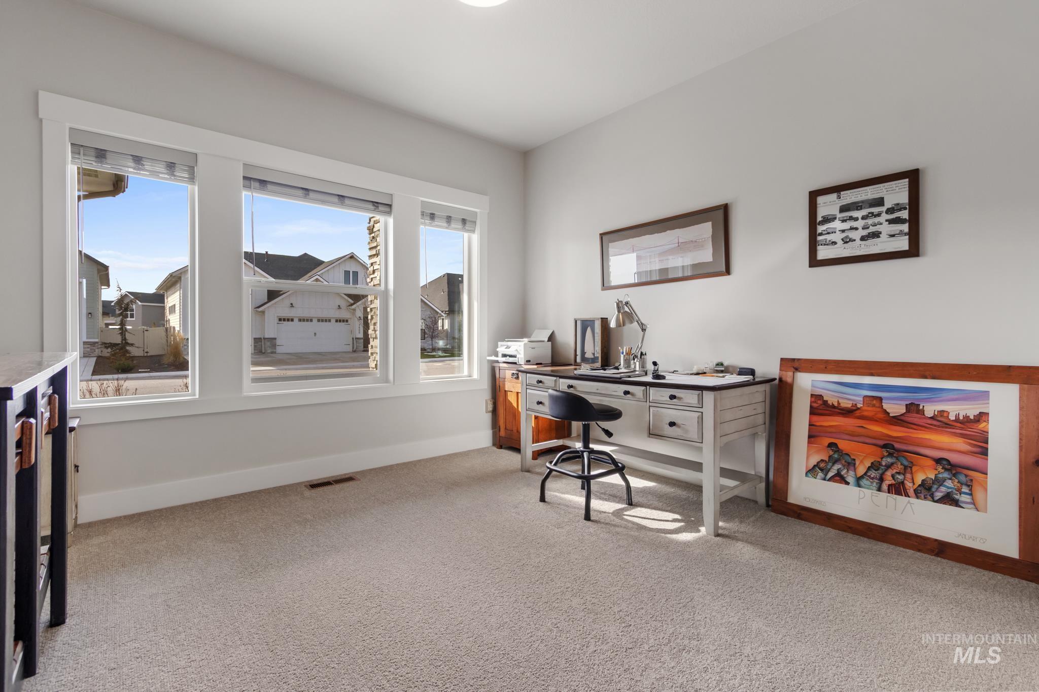 9864 West Aviara Street Star, ID 83669 - Photo 4 of 40 Home office with light carpet and baseboards