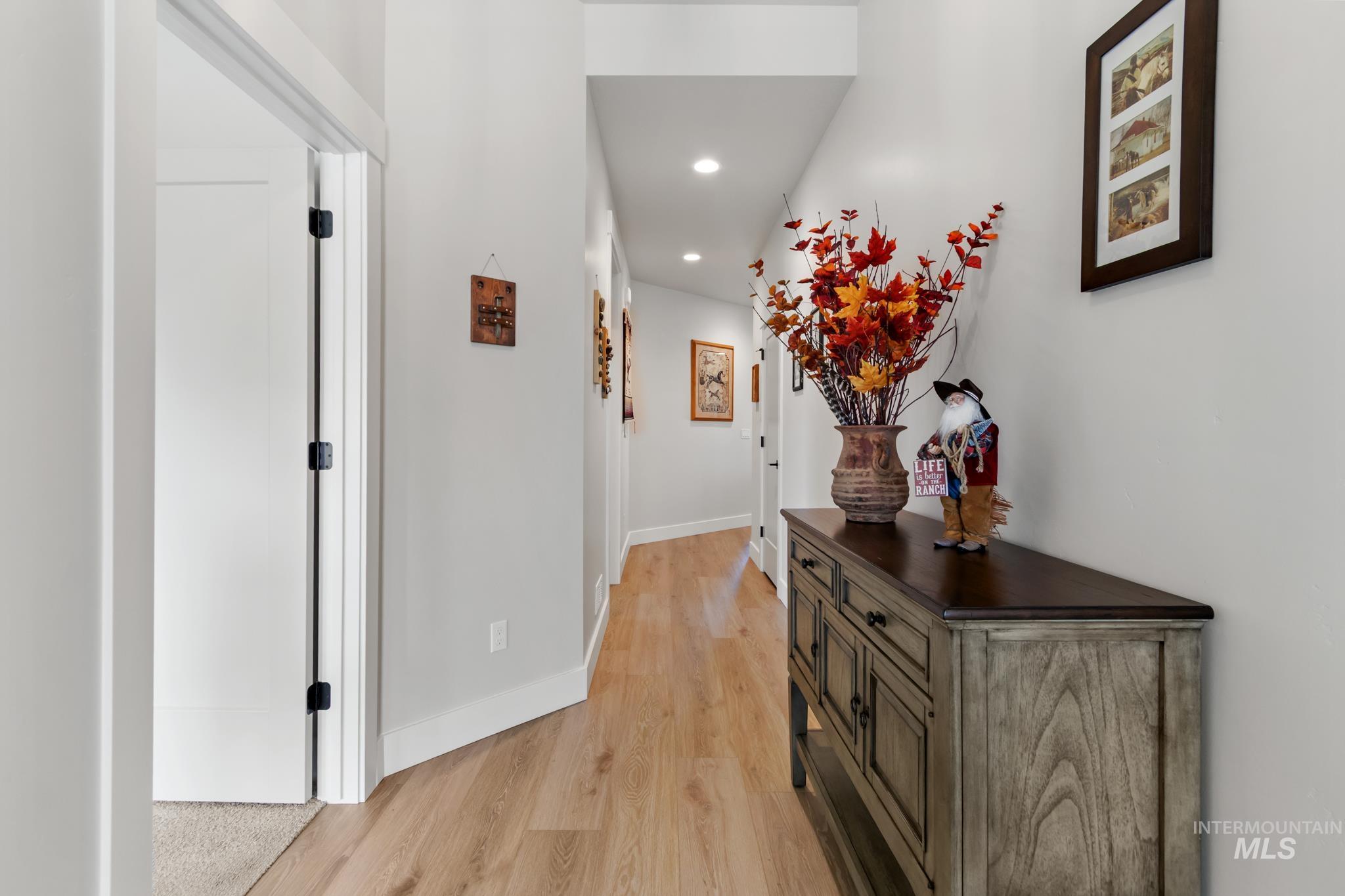 9864 West Aviara Street Star, ID 83669 - Photo 6 of 40 Corridor featuring light wood finished floors and recessed lighting