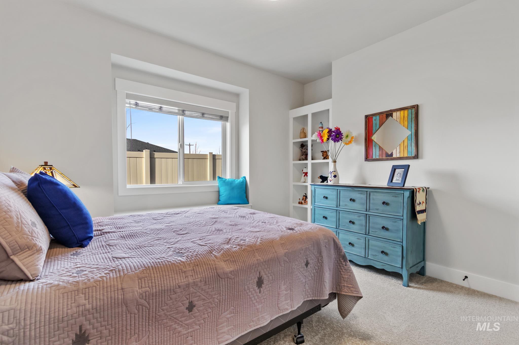 9864 West Aviara Street Star, ID 83669 - Photo 9 of 40 Carpeted bedroom featuring baseboards