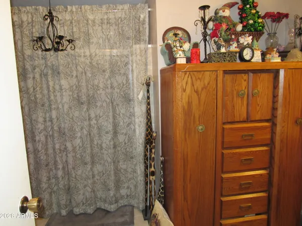 a kitchen with a refrigerator and a stove