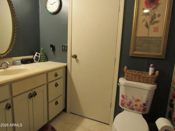 a view of a swimming pool with a lawn chairs