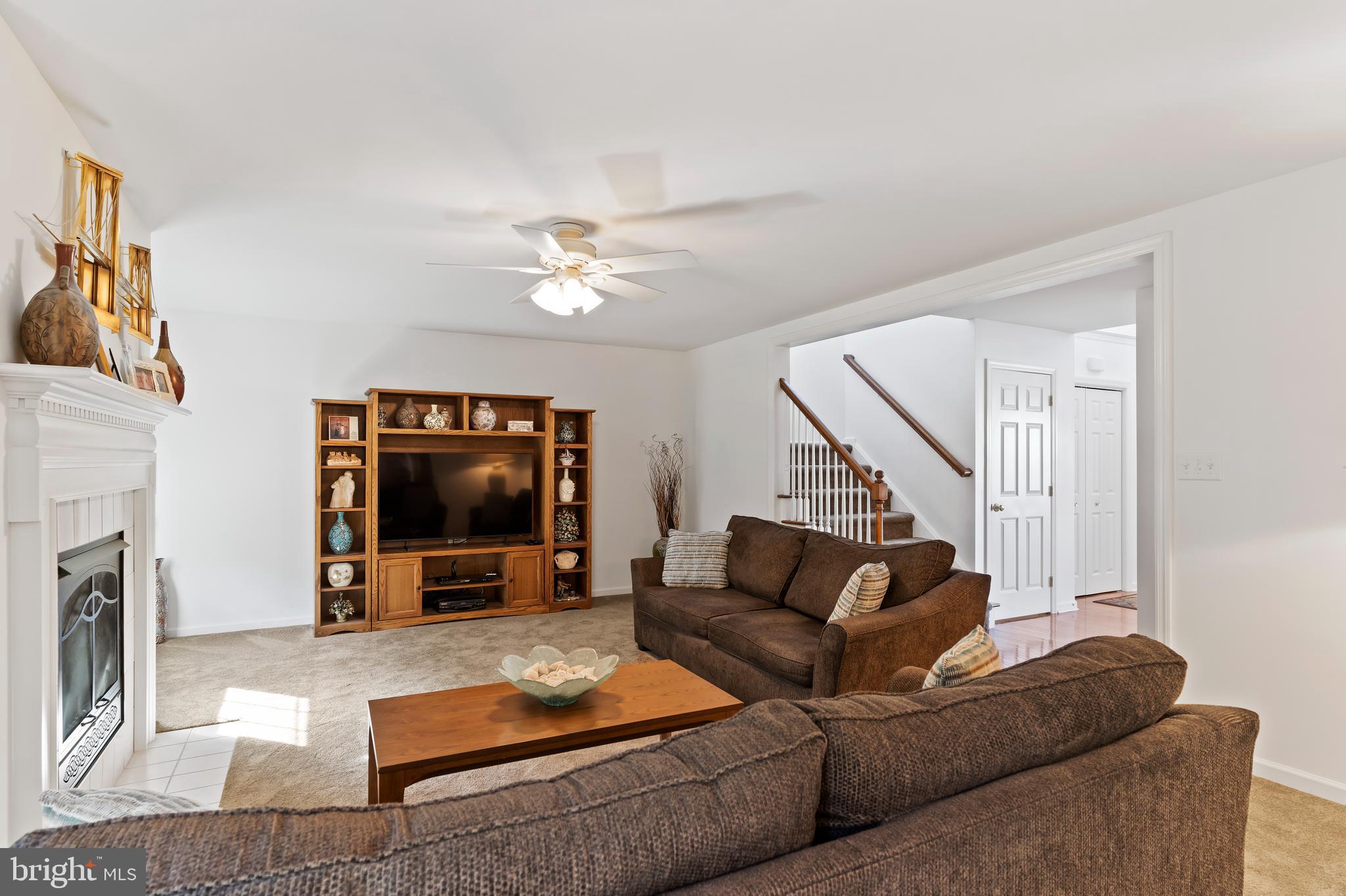 657 Hamaker Road Manheim, PA 17545 - Photo 12 of 41 a living room with furniture and a flat screen tv