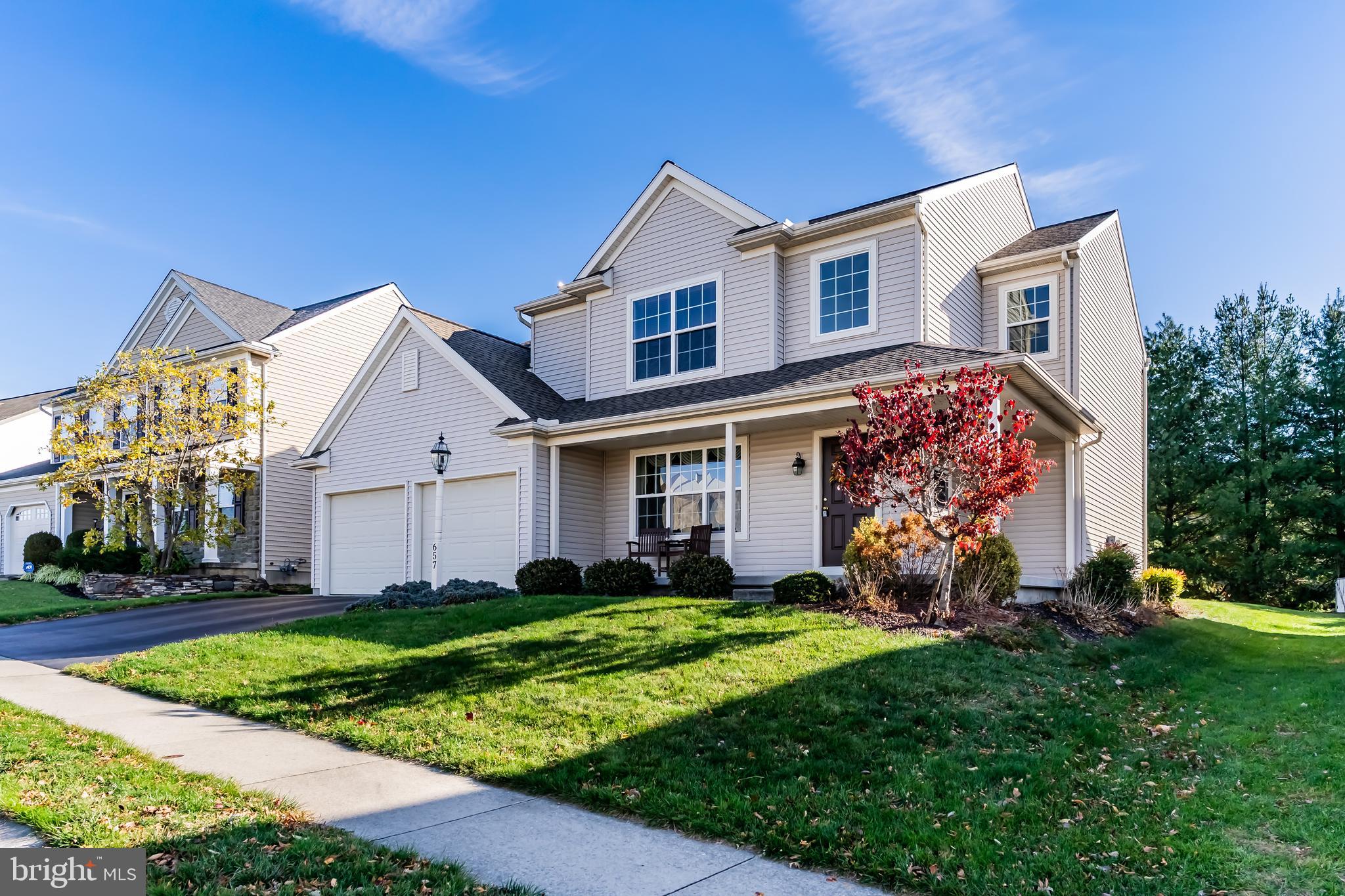 657 Hamaker Road Manheim, PA 17545 - Photo 2 of 41 a front view of a house with a yard and trees