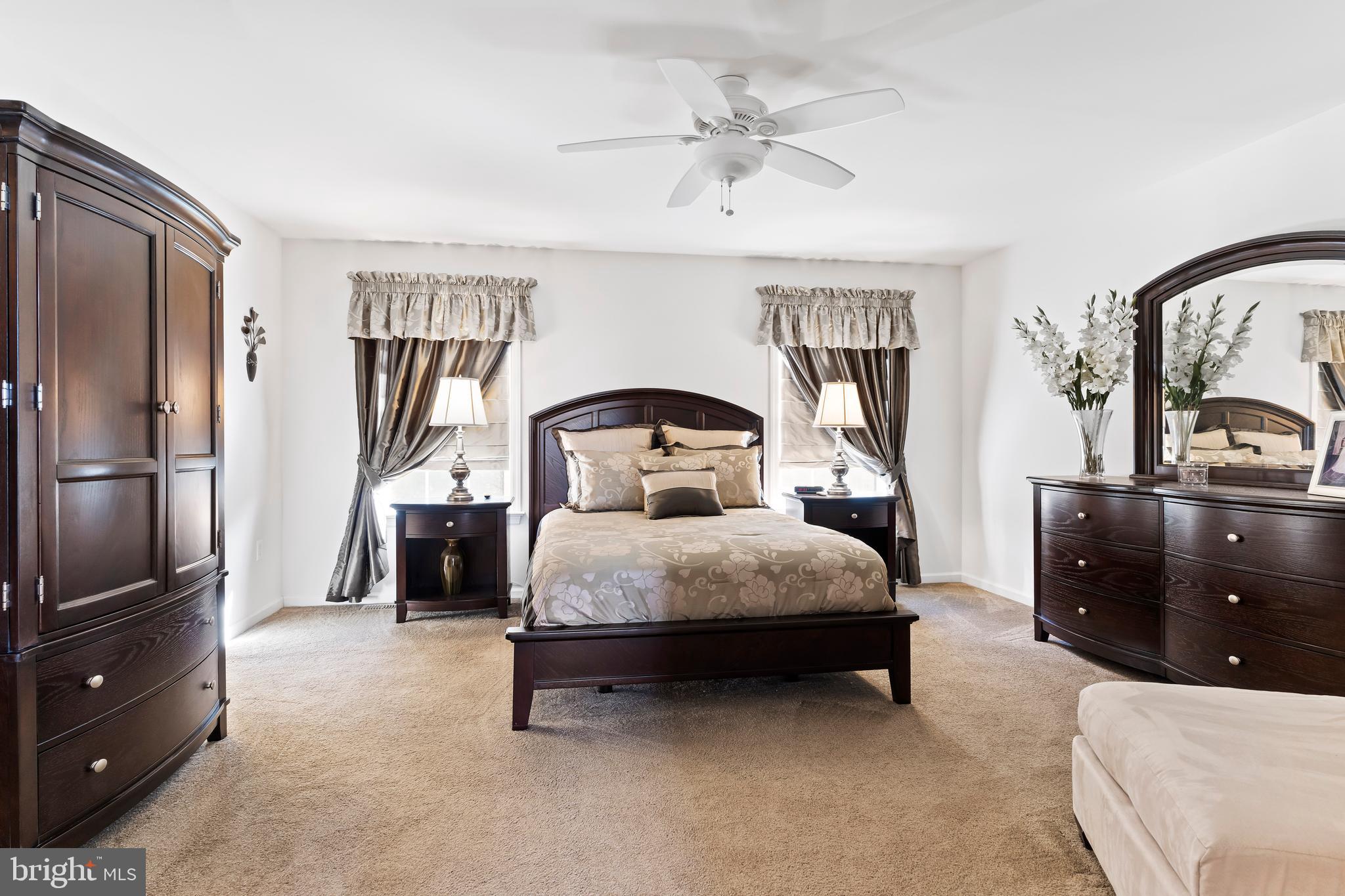 657 Hamaker Road Manheim, PA 17545 - Photo 24 of 41 a bedroom with a bed and a television