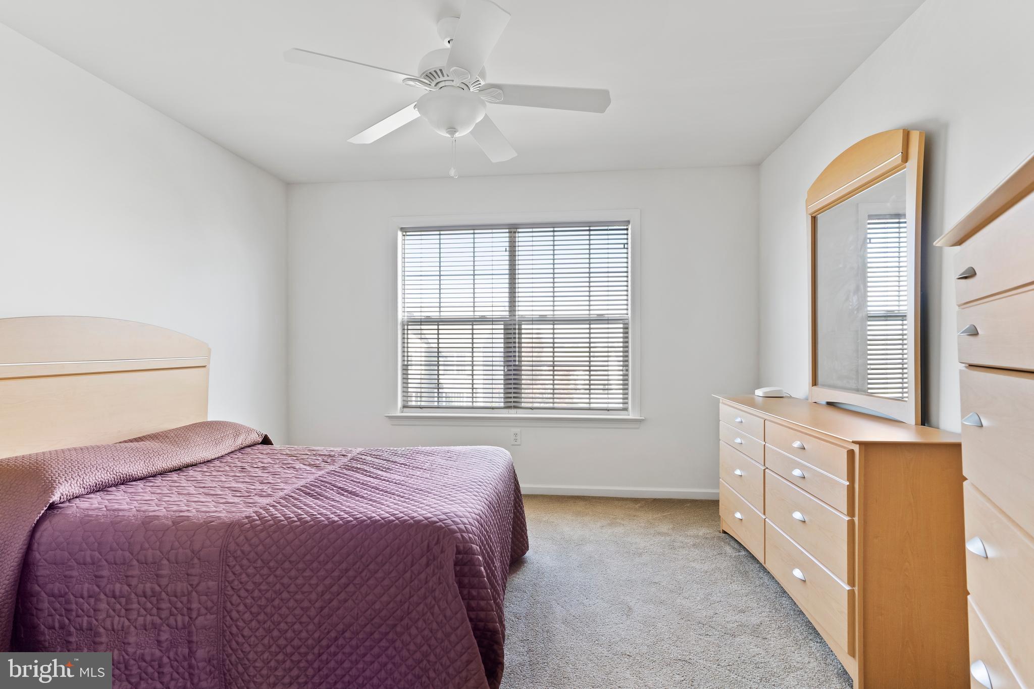 657 Hamaker Road Manheim, PA 17545 - Photo 28 of 41 a bedroom with a bed dresser and a window