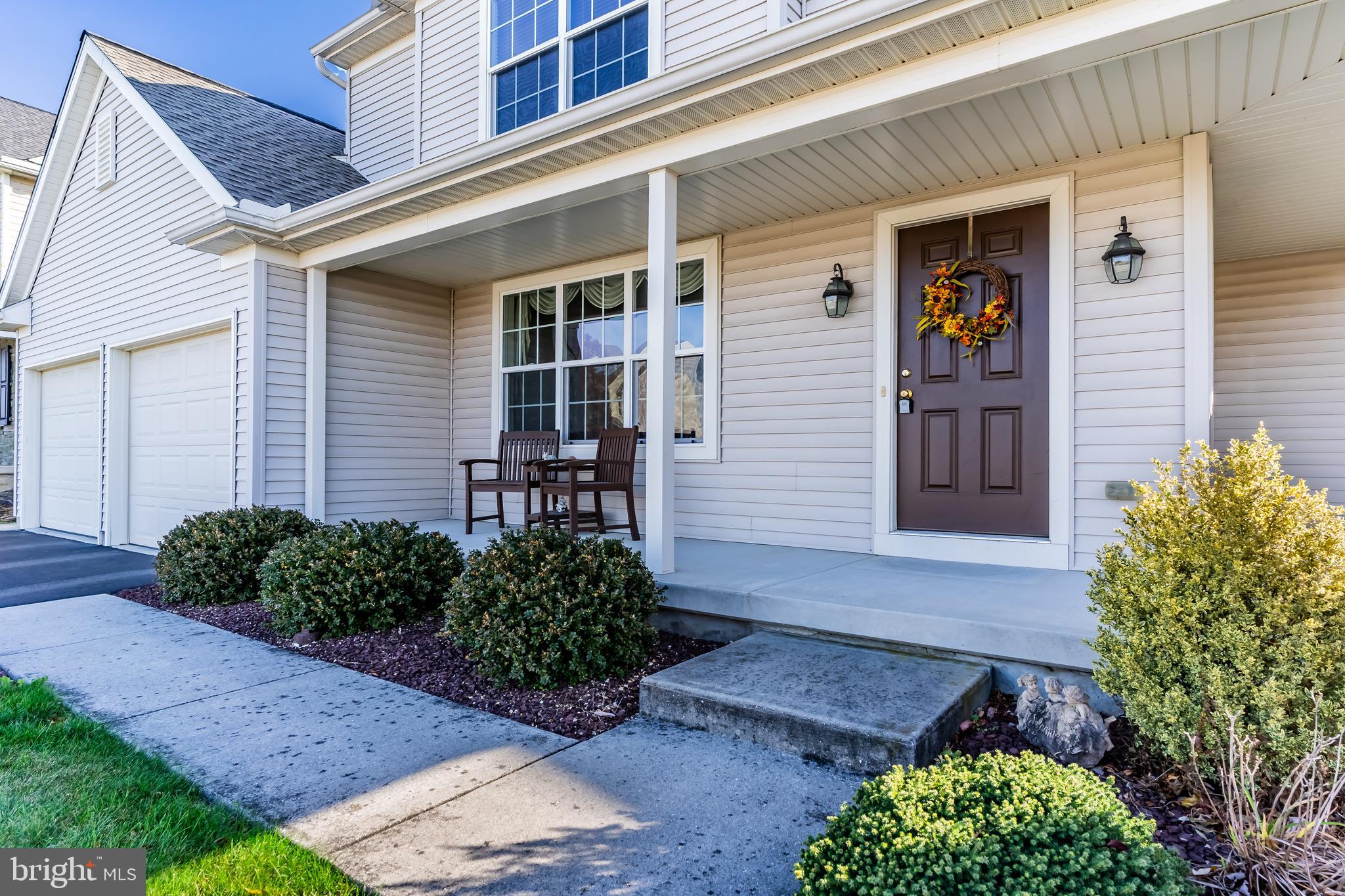 657 Hamaker Road Manheim, PA 17545 - Photo 3 of 41 a front view of a house with garden
