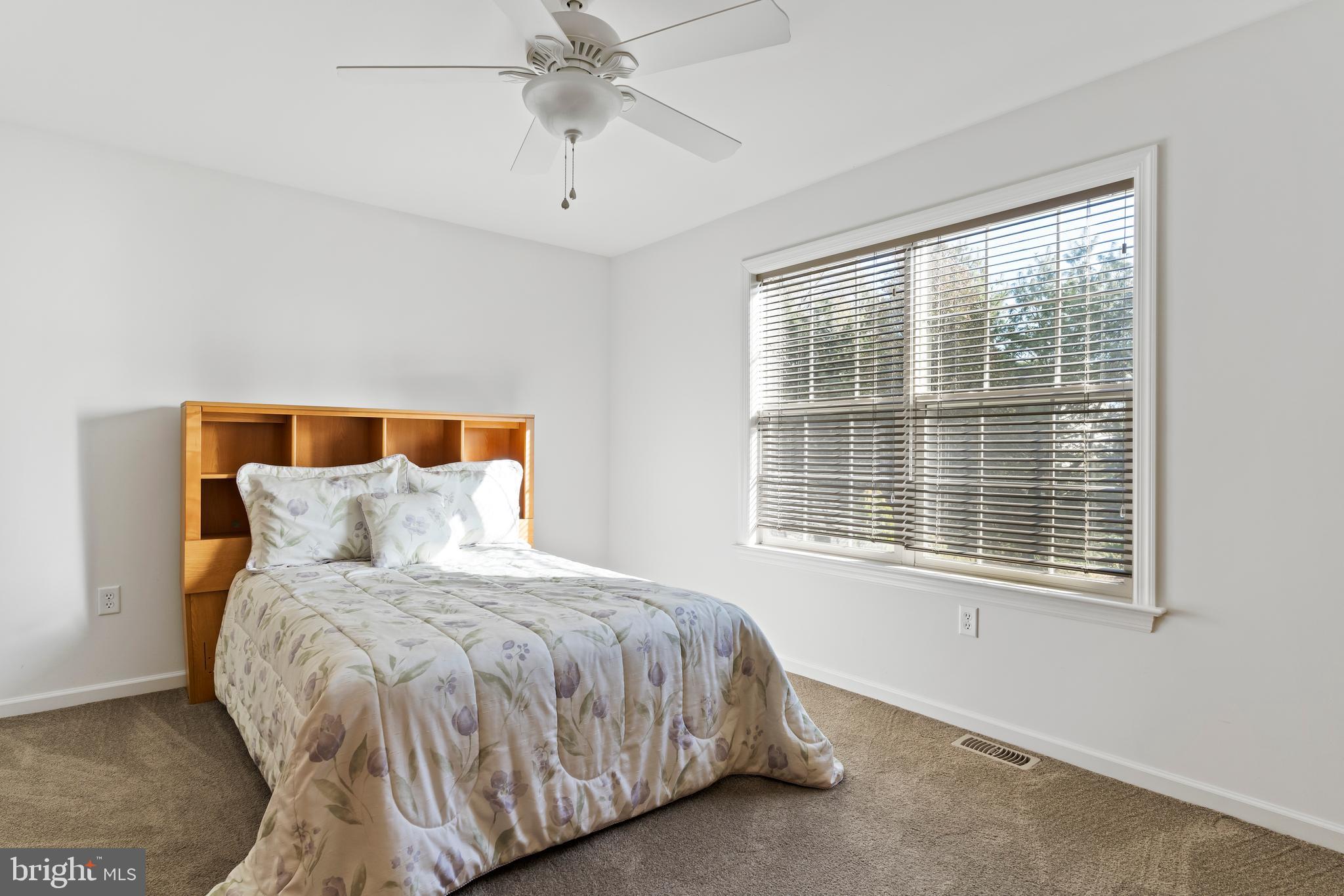 657 Hamaker Road Manheim, PA 17545 - Photo 33 of 41 a bedroom with a bed and a window