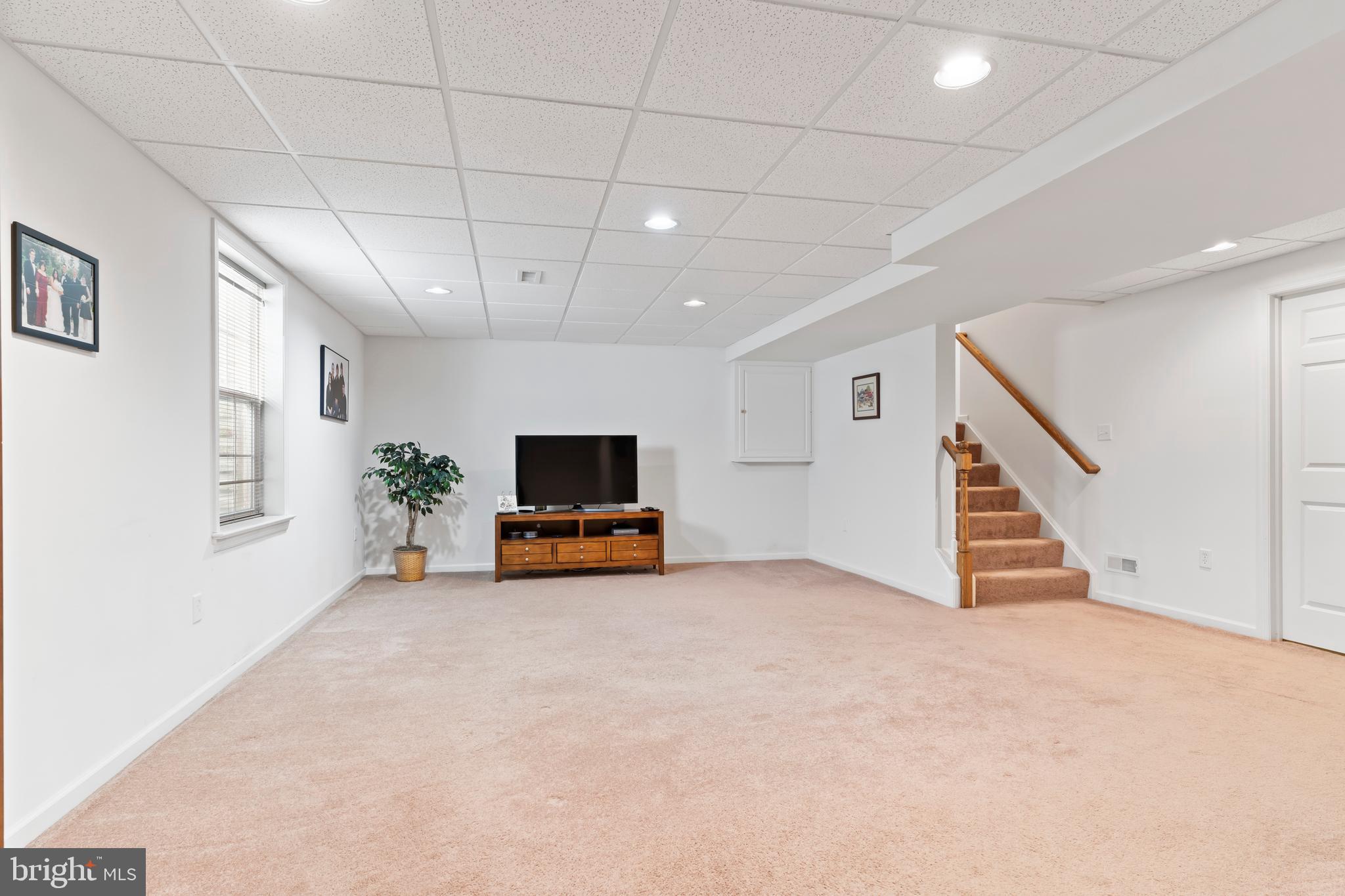 657 Hamaker Road Manheim, PA 17545 - Photo 35 of 41 a view of a livingroom with furniture and a flat screen tv