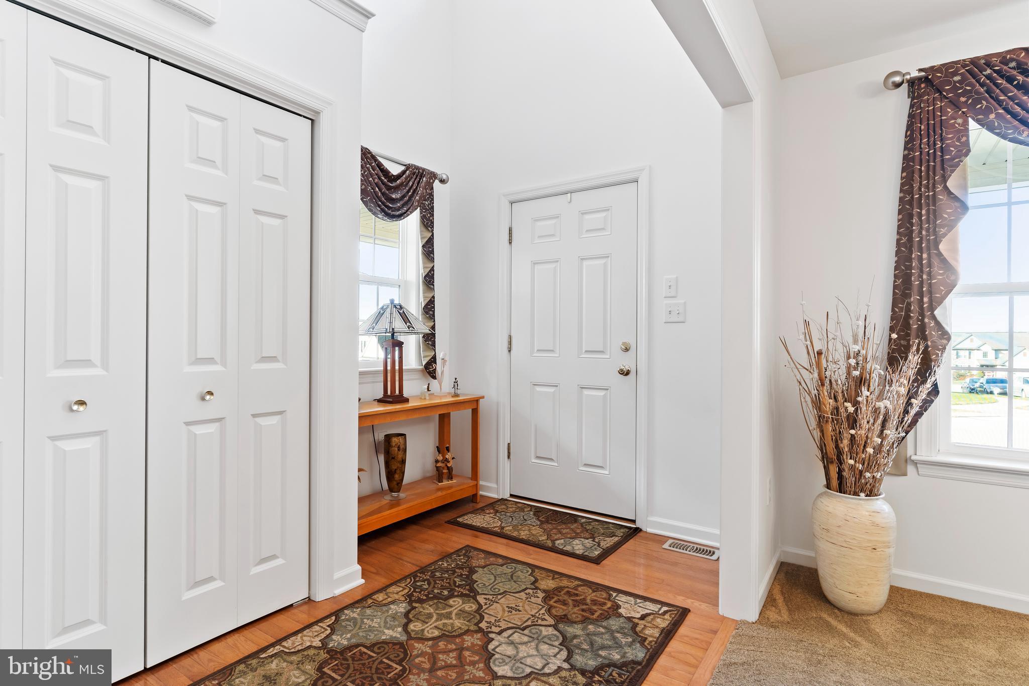 657 Hamaker Road Manheim, PA 17545 - Photo 5 of 41 a room with wooden floor and windows