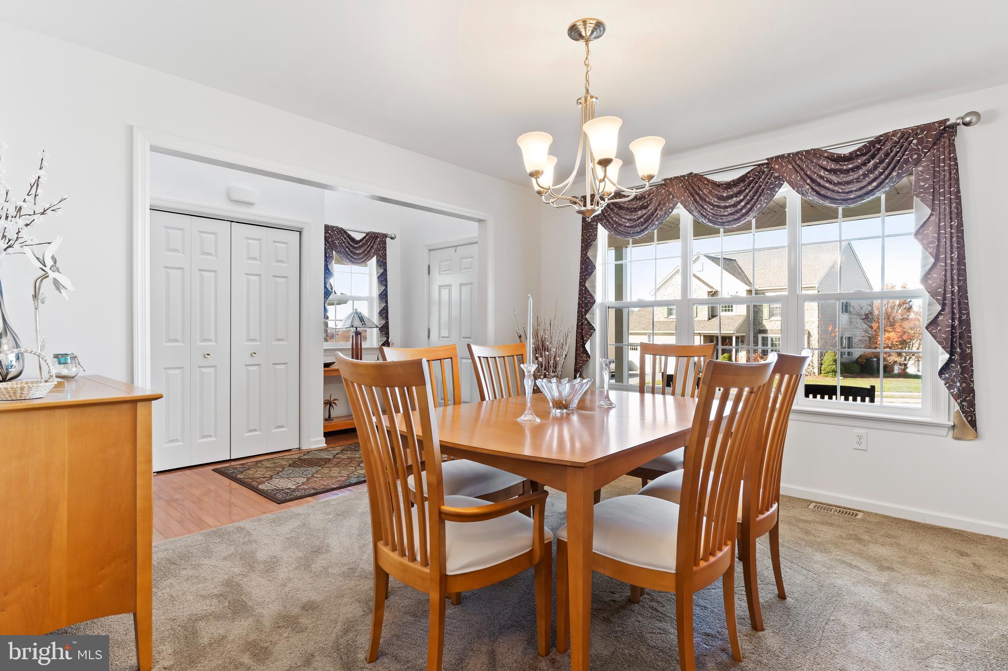 657 Hamaker Road Manheim, PA 17545 - Photo 7 of 41 a view of a dining room with furniture window and wooden floor