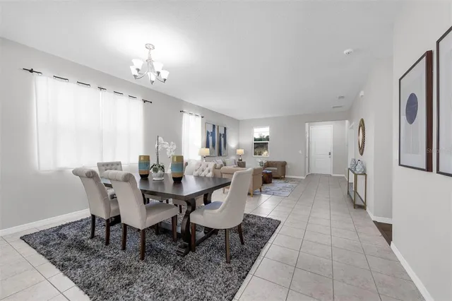 a view of a dining room with furniture