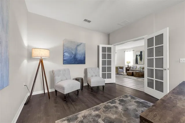 a living room with furniture and a table