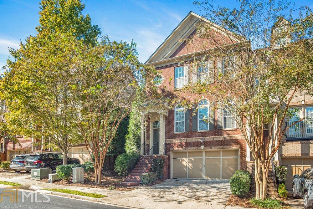 Charming, 3 story end-unit custom Brick and Stone situated inside the gated Buckhead community, Overlook at Lenox