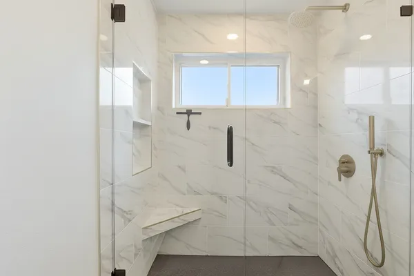 a bathroom with a double vanity sink mirror and double