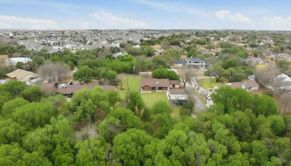 a view of a lake in middle of the town
