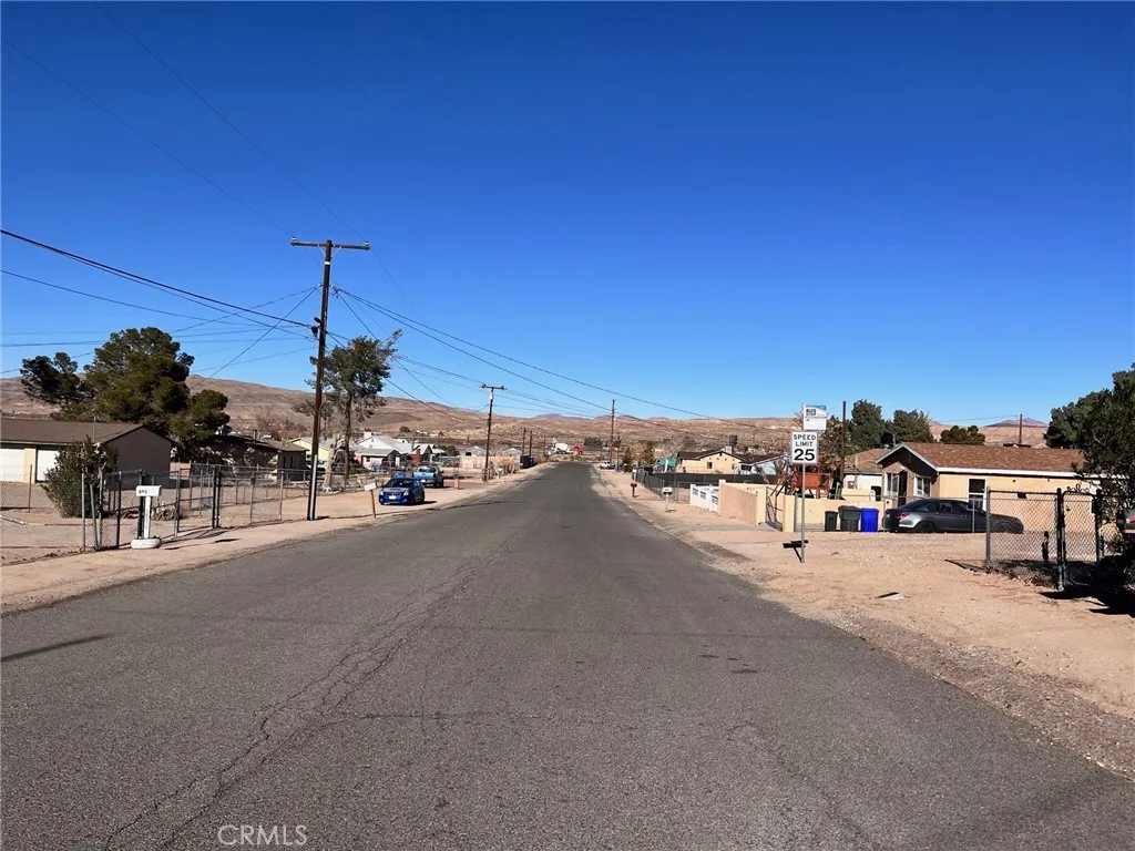 42424137 Armory Road Barstow, CA 92311 - Photo 25 of 30 a view of a city street and car parked