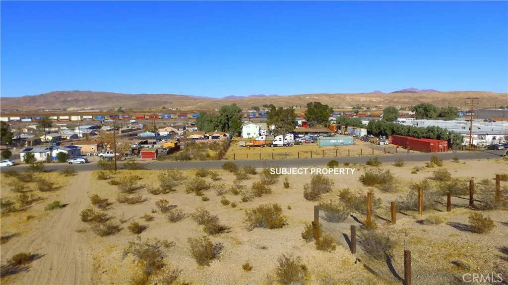 42424137 Armory Road Barstow, CA 92311 - Photo 7 of 30 a view of a city with mountains in the background