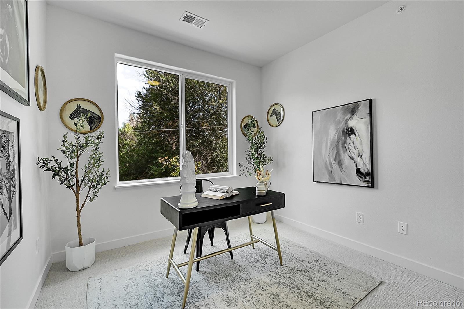 765 East County Line Road Erie, CO 80516 - Photo 22 of 28 a view of a room with a window and furniture