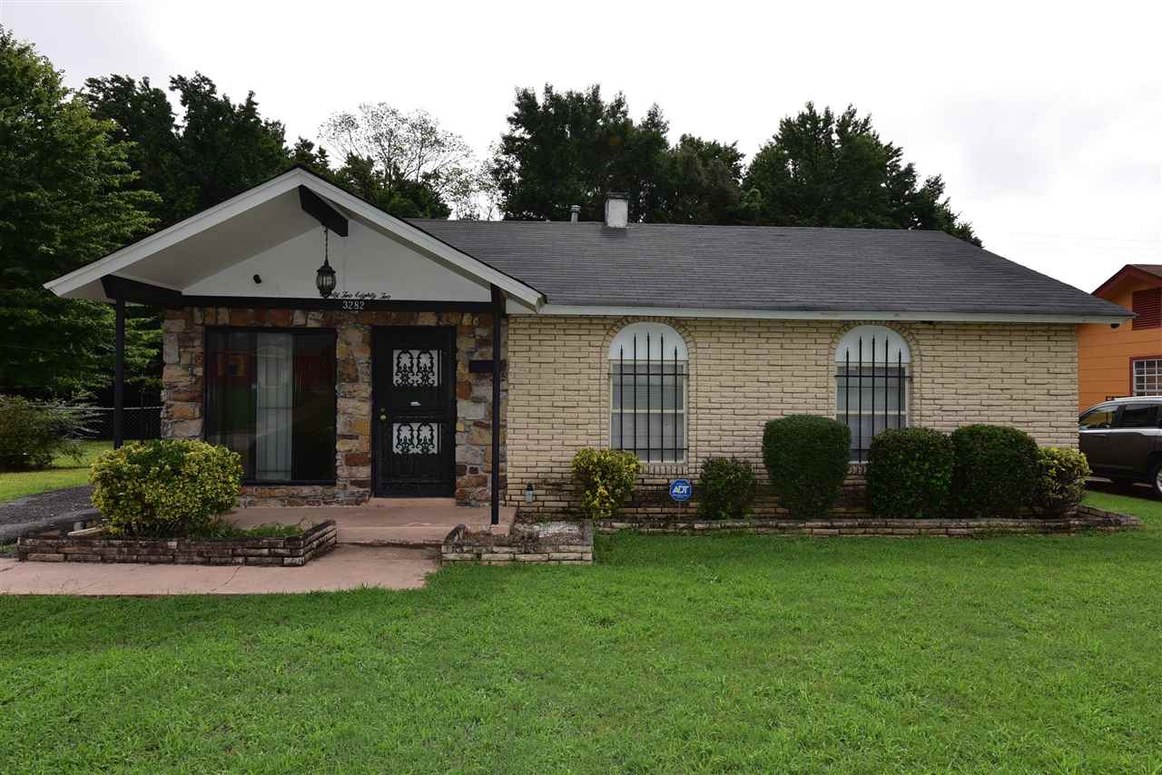 3282 Rochester Road Memphis, TN 38109 - Photo 2 of 21 a view of a house with a yard and plants