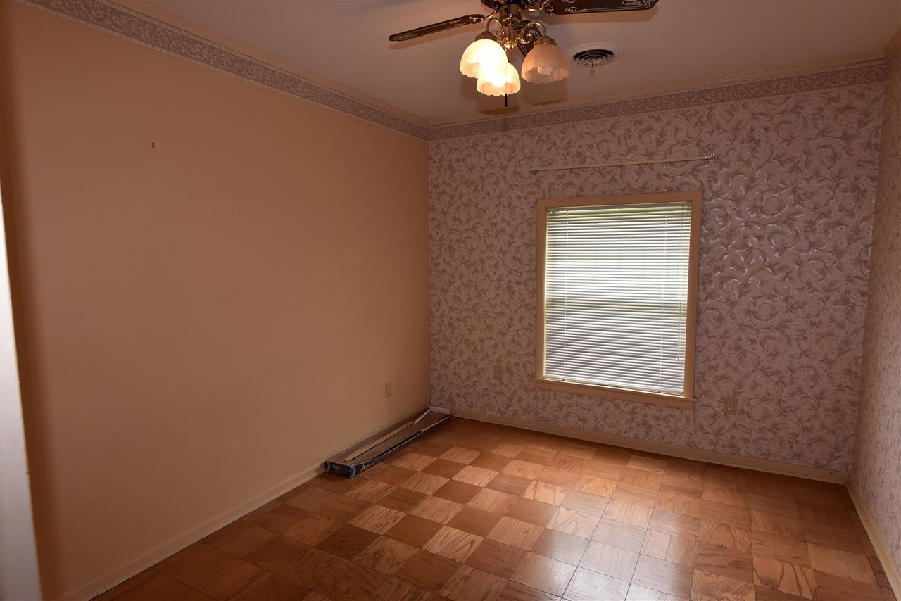 3282 Rochester Road Memphis, TN 38109 - Photo 8 of 21 an empty room with a window