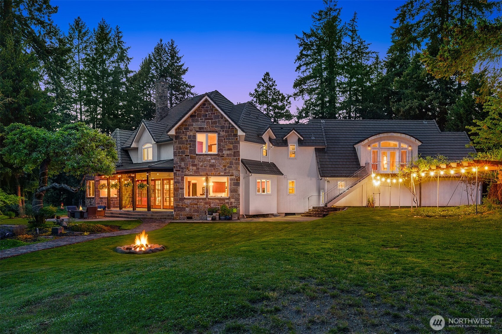 1000 Creso Road South Spanaway, WA 98387 - Photo 24 of 40 a view of a house with a swimming pool