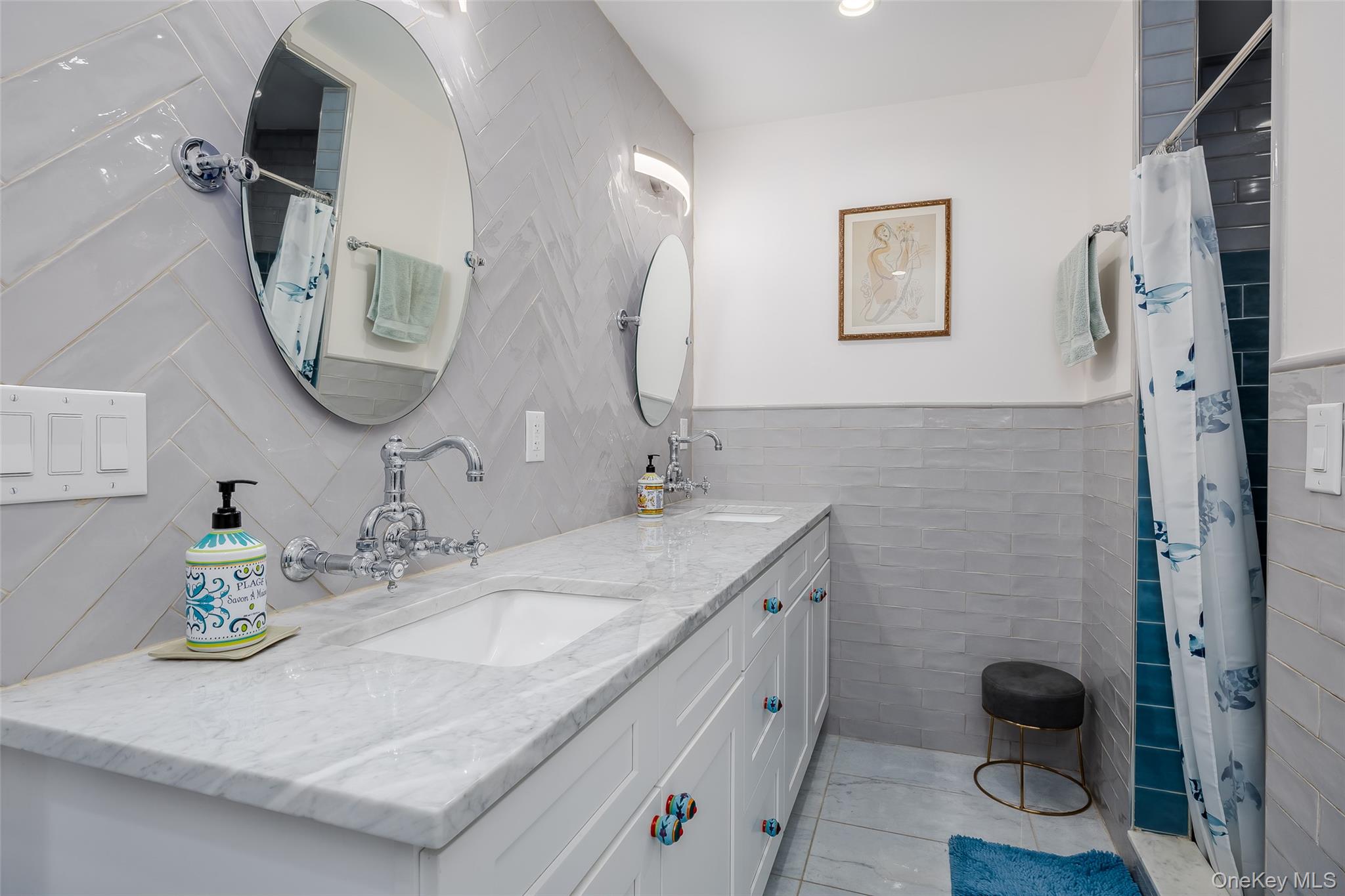 3 Earl Road Melville, NY 11747 - Photo 18 of 35 a bathroom with a granite countertop sink a toilet and a mirror