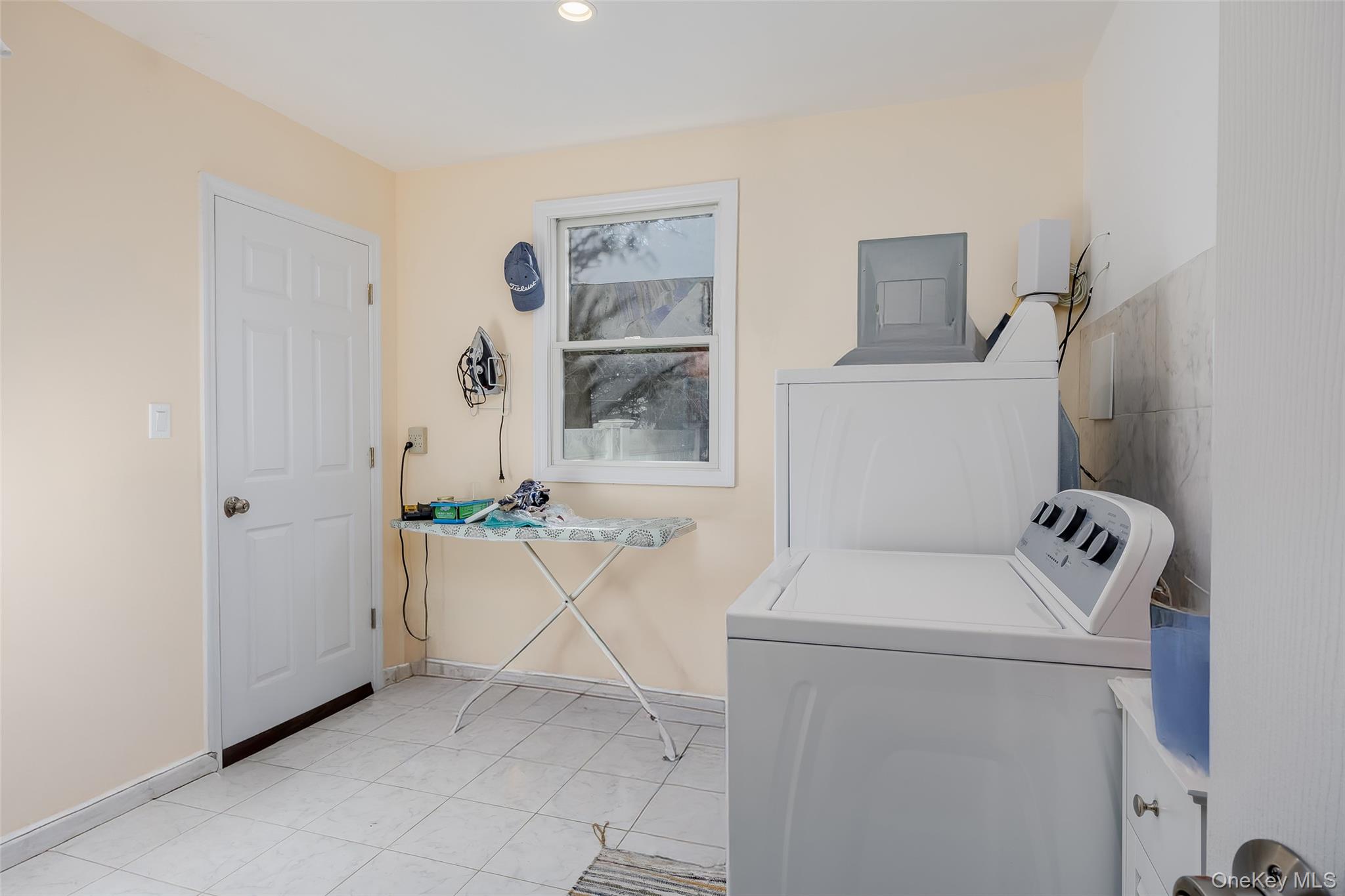 3 Earl Road Melville, NY 11747 - Photo 22 of 35 a utility room with dryer and washer