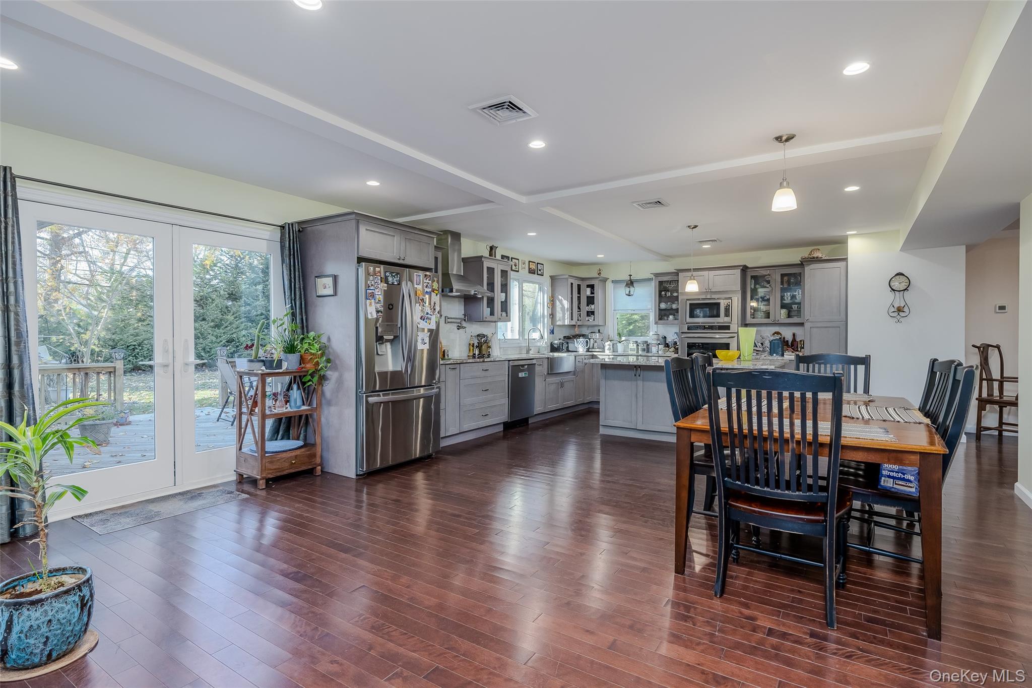3 Earl Road Melville, NY 11747 - Photo 3 of 35 a living room with lots of furniture and a wooden floor