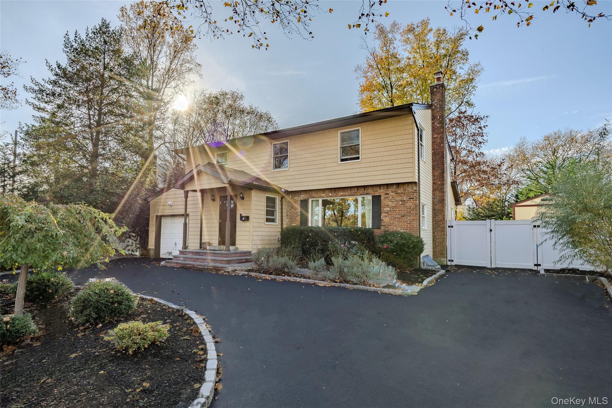 3 Earl Road Melville, NY 11747 - Photo 35 of 35 a front view of a house with a yard