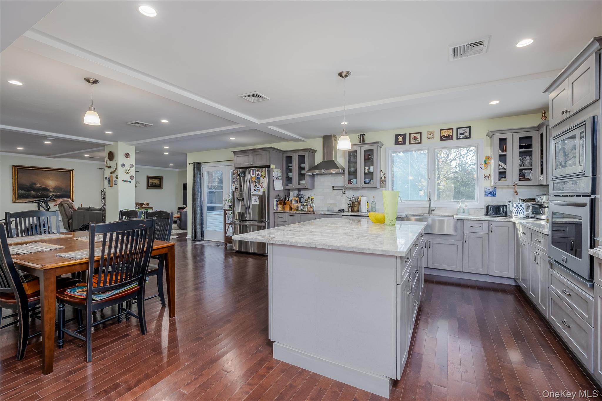 3 Earl Road Melville, NY 11747 - Photo 5 of 35 a kitchen with a sink a counter top space and stainless steel appliances