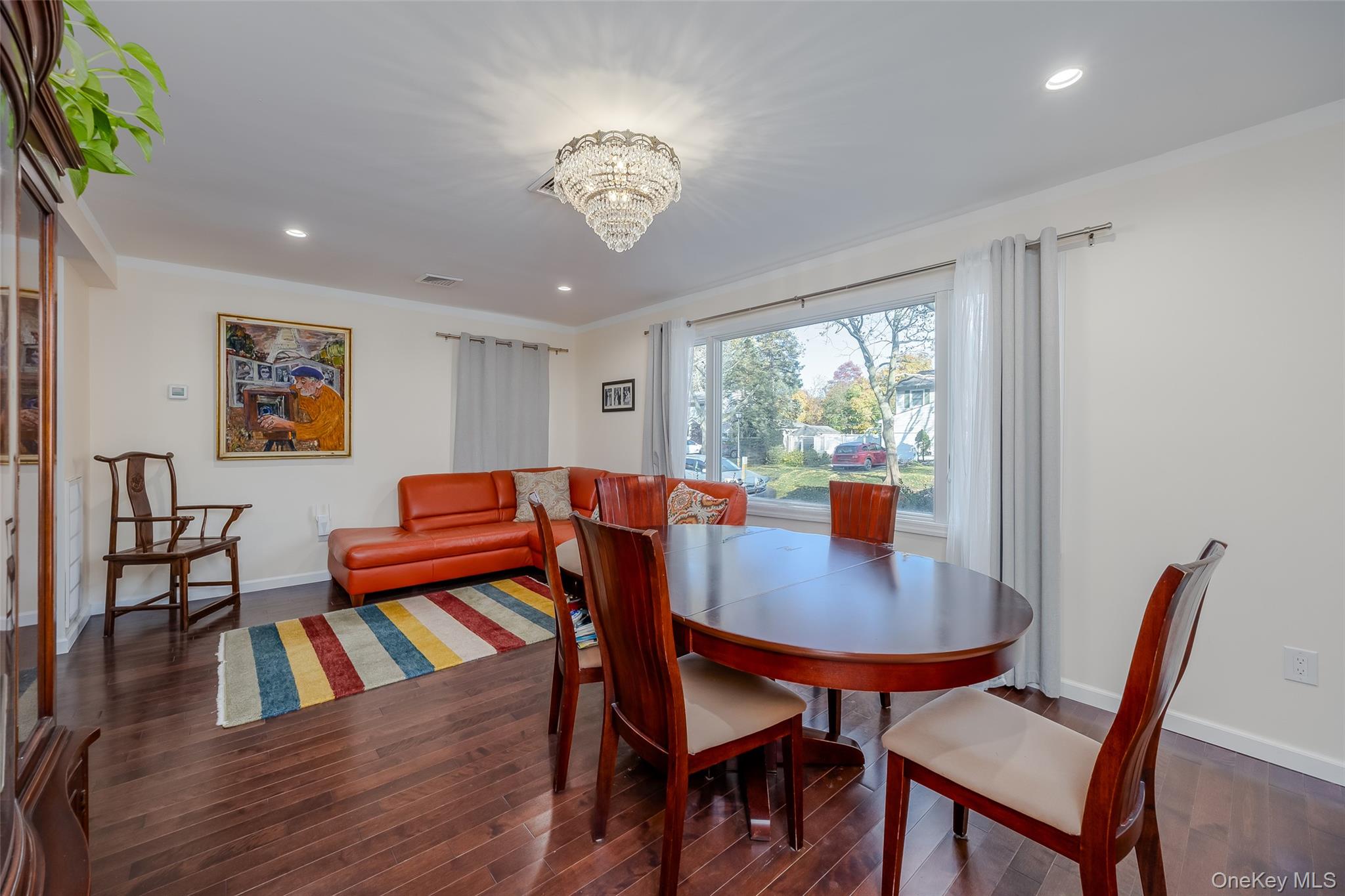 3 Earl Road Melville, NY 11747 - Photo 8 of 35 a view of a dining room with furniture window and wooden floor
