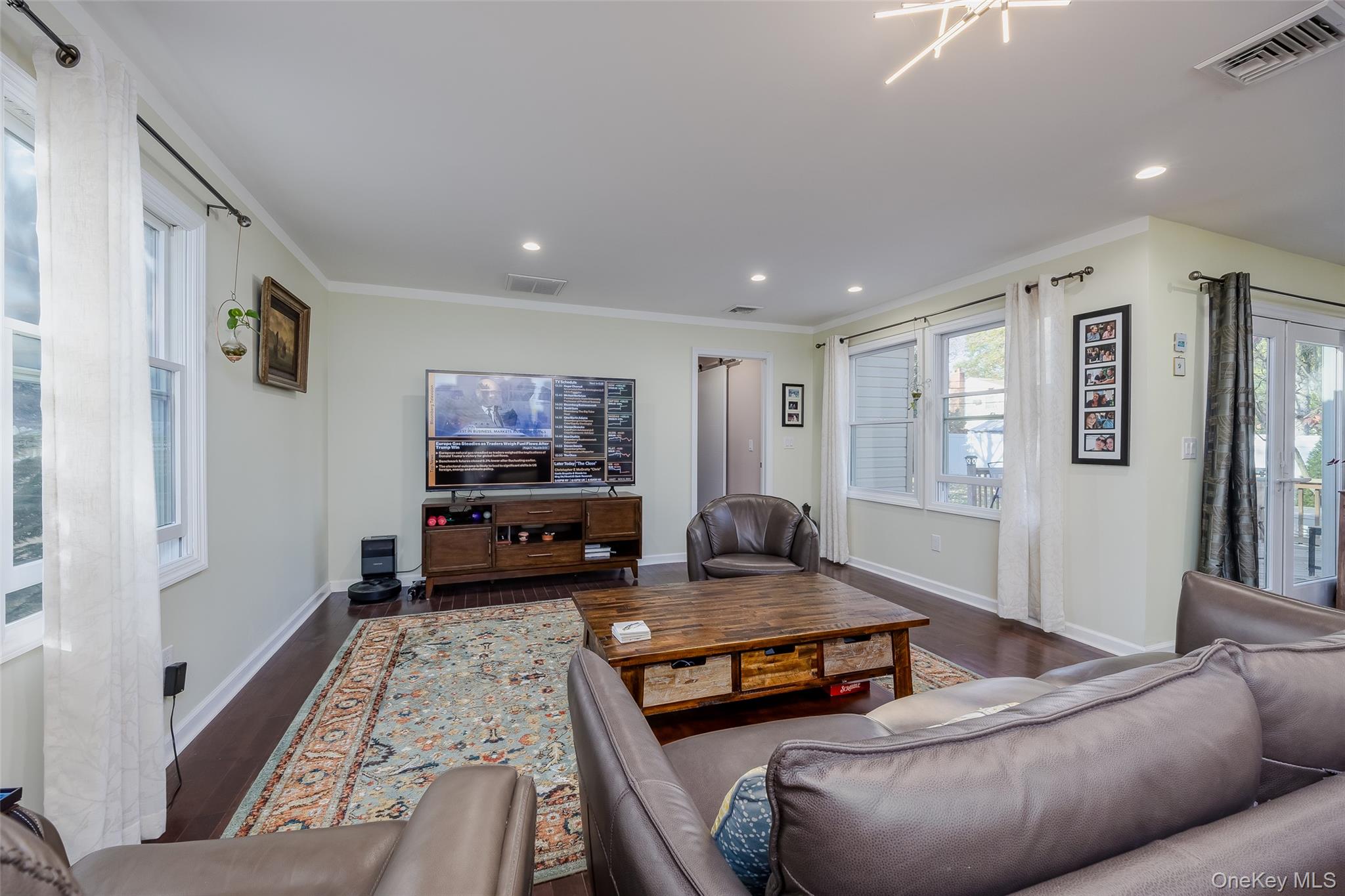3 Earl Road Melville, NY 11747 - Photo 10 of 35 a living room with furniture and a couch