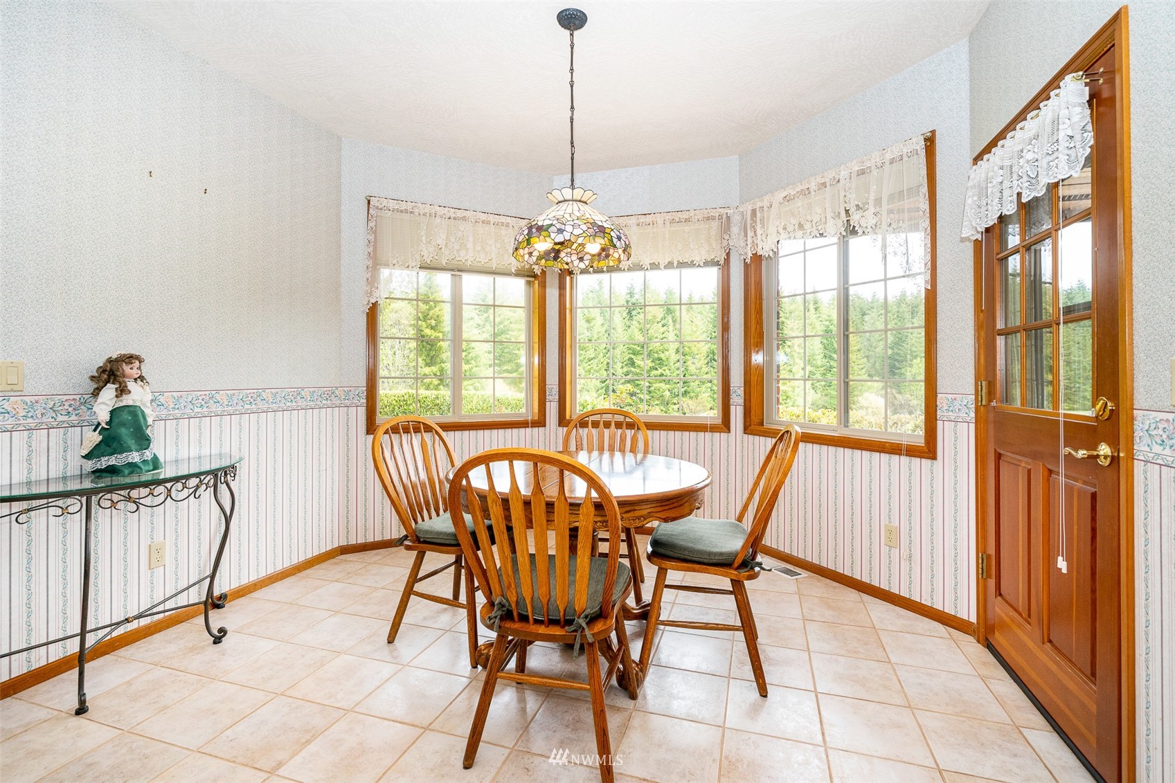 206 Haskins Road Chehalis, WA 98532 - Photo 12 of 38 a view of a dining room with furniture window and outside view