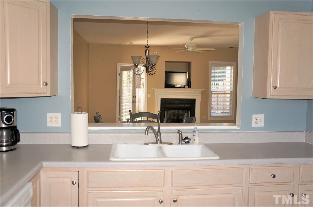 9204 Grassington Way Raleigh, NC 27615 - Photo 12 of 29 a bathroom with sink and mirror